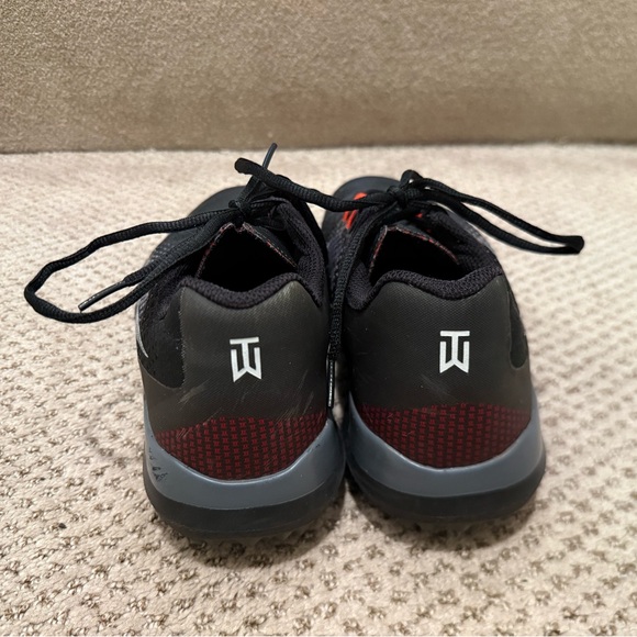 Nike Black and Gray Sneakers with Red Highlights